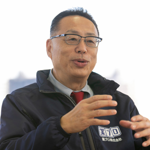 椎谷 範一